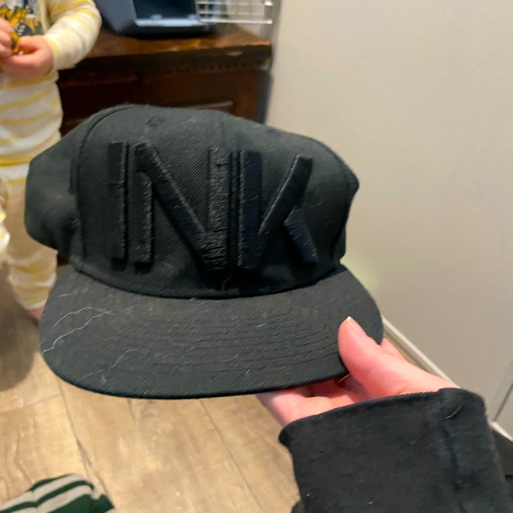 Black INK ADDICT flat bill hat.